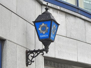 External police station wall sign for An Garda Síochána, more commonly referred to as the Gardaí or "the Guards", the police service of the Republic of Ireland.